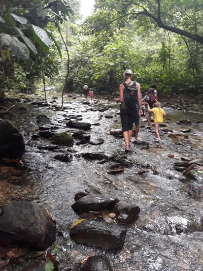 Trek through rivers and hills.