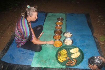 Our guest enjoys a delicious dinner prepared by our guides.